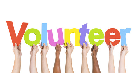 35334421_S_volunteer_hands_volunteer sign.jpg